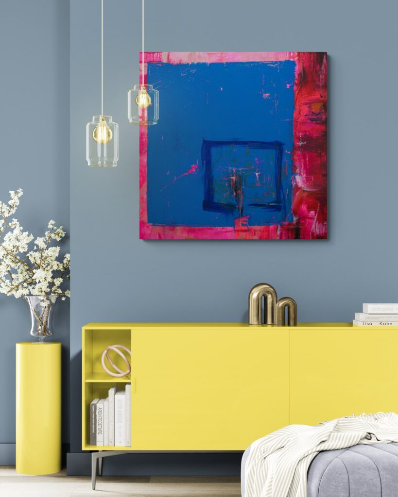 Farbenfrohes Interior Design: Modernes abstraktes Bild in Blau über einem gelben Sideboard für mutige Raumkonzepte.